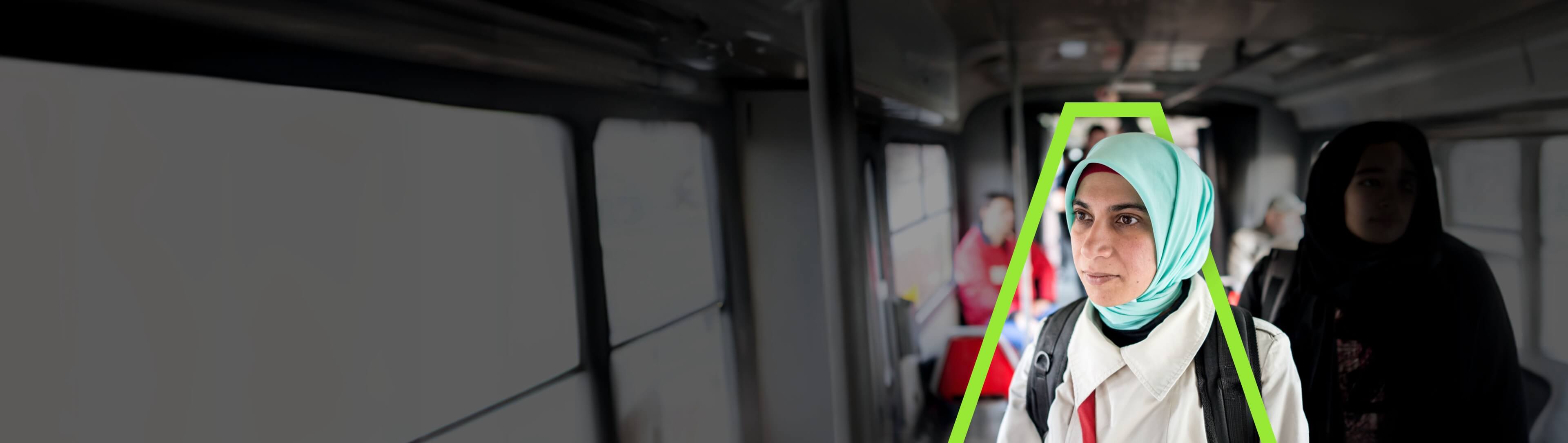 A young woman travelling by bus